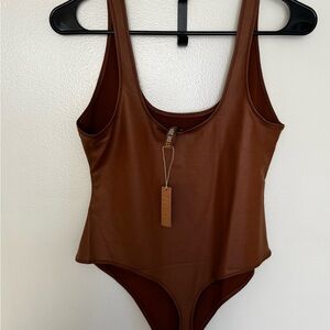 Skims Kim Kardashian Wet Jersey Tank Thong Bodysuit